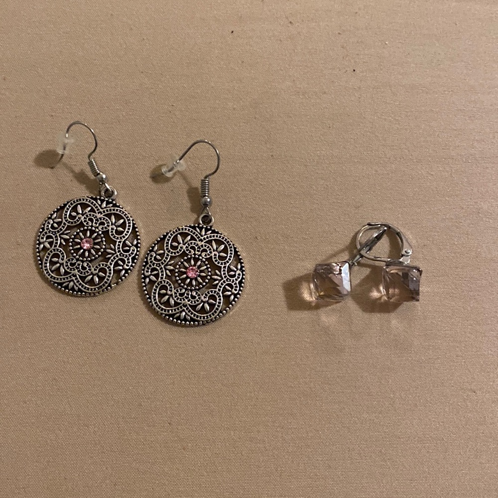 Pink gem earrings including both
